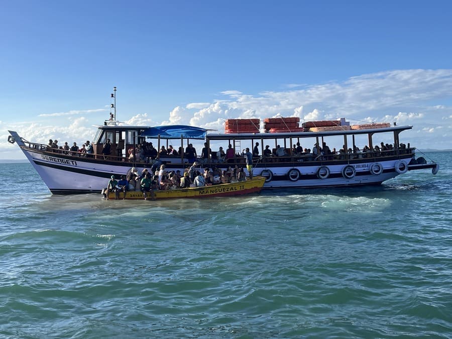 Boat tour with passengers in the Baía de Todos os Santos, near Salvador, Brazil