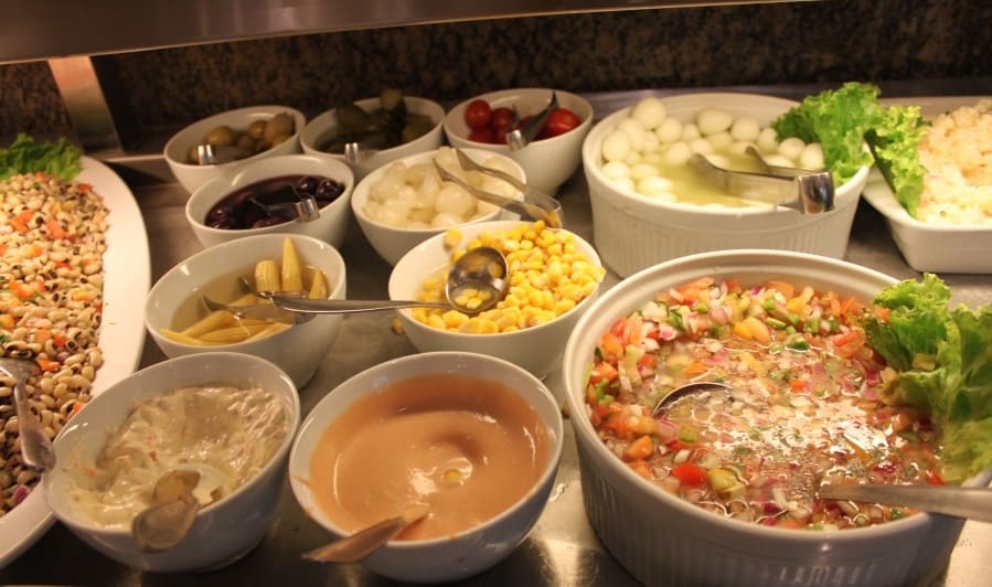 All-you-can-eat buffet served at a restaurant included in many Rio Full Day Tours.